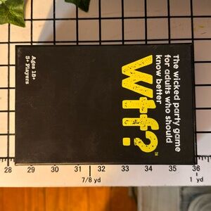 Wtf? The wicked party game for adults who should know better.